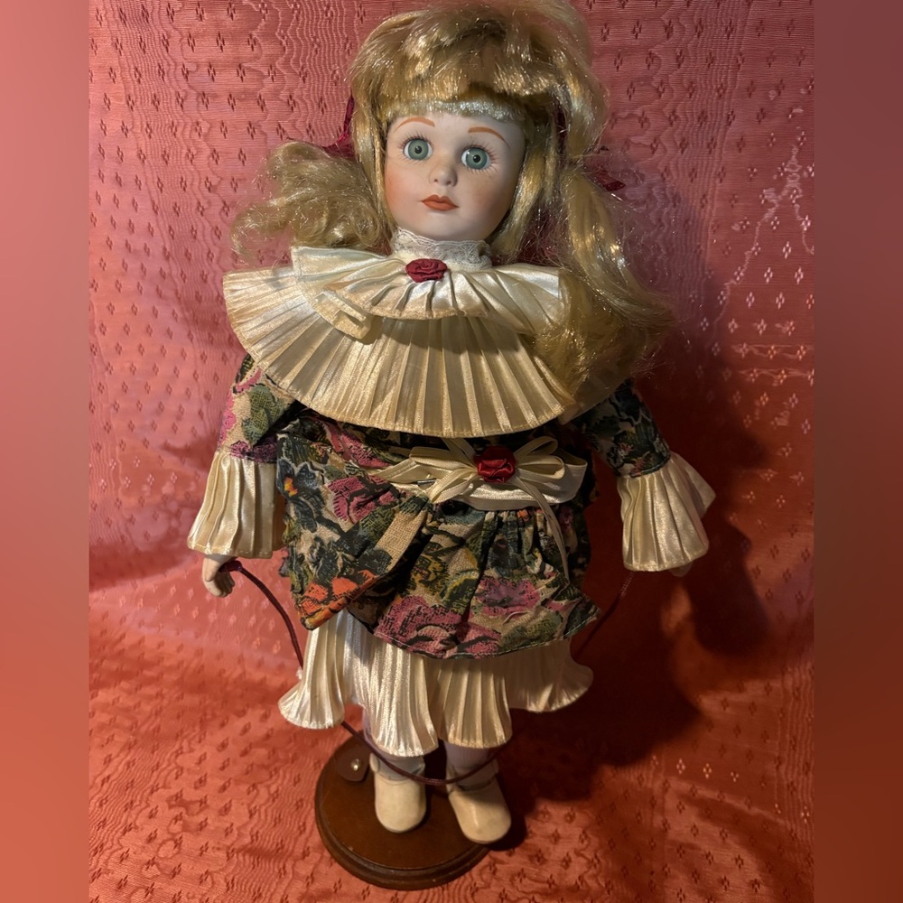 Vintage Porcelain Doll with Floral Dress
